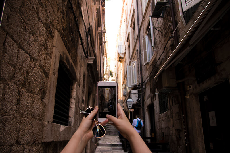 Lauren taking a photo in Dubrovnik